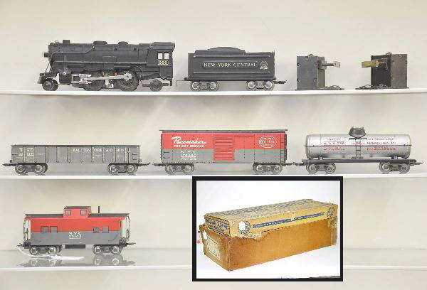Scarce Boxed Marx Montgomery Ward Set 3014M: Set includes trucking terminal, which appears complete, disassembled in its original box. Set also includes 999 steam loco, NYC tender, NIAX tank car, NYC boxcar, B&O gondola, NYC caboose, track, swit