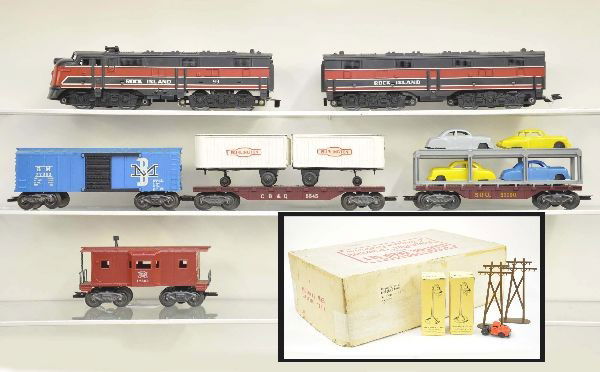 Deluxe Boxed Marx Diesel Set 40965: 99 Rock Island F9 AB diesels, SOU auto loader, B & M boxcar, 5545 flat with Burlington trailers, scarce Rock Island caboose. Also includes railroad station kit with some accessories loose, tractor for