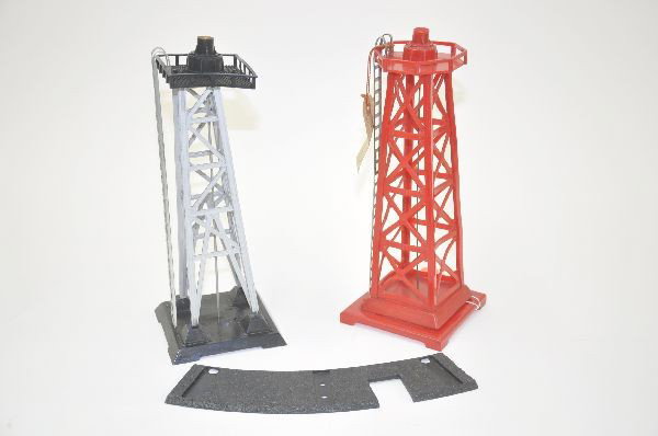 Three Unusual Marx Accessory Prototypes: Beacon tower, molded in red bottom painted Model No. 1379 Girard 1/19/50 Also has paper tag taped on reading RG 4446 and art, 3136 has factory tag which says "received from New York, 6/17/52". Second 