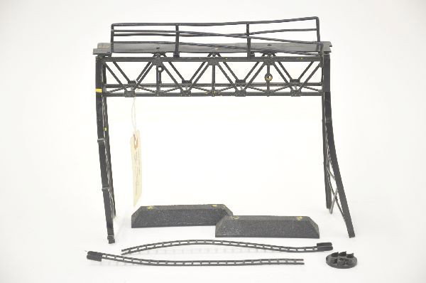 Rare Marx Prototype Signal Bridge: Originally from the Dick McNary collection. Base painted 2312. Made of unusual vinyl plastic with metal bases. Reputed to be a HO gauge accessory but size appears O-gauge. Partially disassembled due t