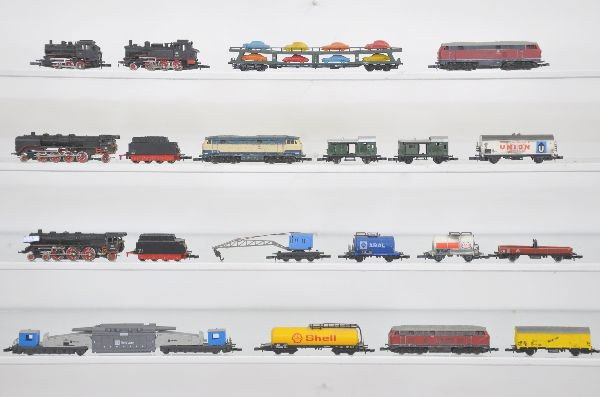 Huge 50 plus Piece Marklin Z-Gauge Freight Assortm: Two 4-6-2 steam locos and tenders, three diesel engines, 0-6-0 and 2-6-0 tank locos, balance of lot is a nice assortment of freight cars and two passenger cars. All used, but should clean nicely C7-8