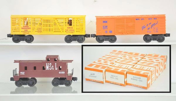 Three Unusual Hagerstown Freight Cars: 6059 M& StL caboose, maroon version; 6014-85 Frisco boxcar, scarce variation with blue heat stamp lettering; 6473-60 horse transporter car. Condition: all are unrun in scarce Hagerstown boxes, factory