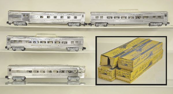4 Boxed American Flyer Passenger Cars: S-Gauge, 2 #962 Vista-Domes, one missing plate; 960 combine, 963 observation, All chrome finish, worn original boxes. All show moderate to heavy playwear. C5-6