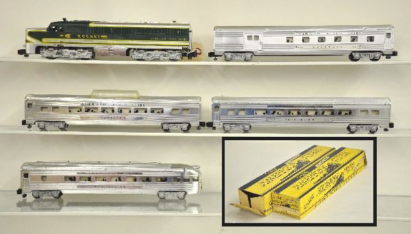 5p American Flyer Passenger Set: S-Gauge. 474 Rocket PA Alco A diesel, chrome version, 960 combine with OB, 961 Pullman, 962 Vista-Dome, 963 observation with OB, all chrome cars. Condition: loco has broken ornamental horns. All show 