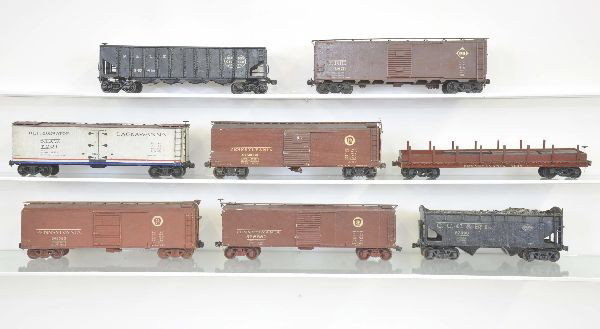 8 Custom PRR O-Scale Cars: Two-rail. 2 hoppers, 4 boxcars, reefer; stake flat with load. All nicely built, some are metal, some wood. All show light to moderate playwear, C6-7