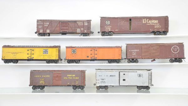 7 Custom O-Scale Freight Cars: Two-rail, ribbed boxcar, 2-reefers; double-door boxcar, 2 brass side boxcars, nicely built. All show light to moderate playwear, C6-7