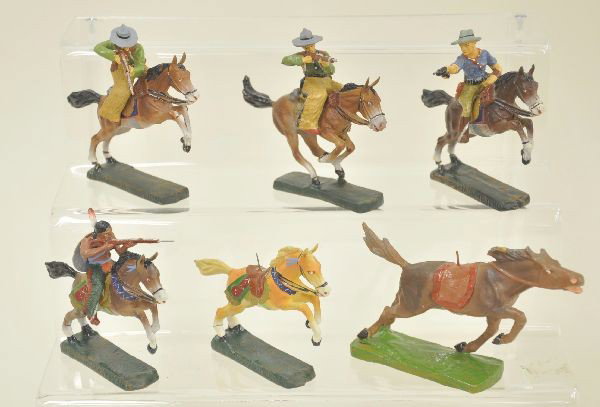 10 pc Elastolin Cowboy and Indian Lot: 3 mounted cowboys, one is different, mounted Indian and two Indian horses. Condition: paint is unusually bright and clean, showing light wear, a few hairline age cracks but nothing offensive. Otherwis