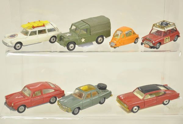 7 pc Corgi Vehicle Lot: Heinkel-I , Rover 2000TC with spare; Land Rover 109 Military; Citroen Safari Ski Club Set with figure, 4 skis and poles; VW 1600 TL, BMC; Mini Cooper; Marlin Rambler fastback. All show moderate playwe