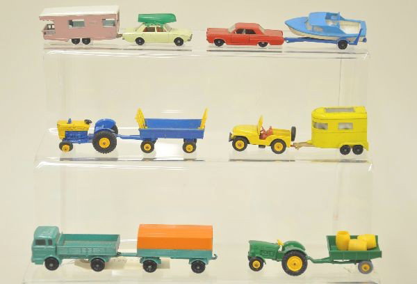 12 pc Matchbox Vehicle and Trailer Lot: #45 Ford Corsair with #23 caravan trailer, #22 Pontiac GP Sport with #9 boat and trailer, #39 Ford tractor with #40 hay trailer, #72 Jeep with #43 horse trailer, #1 Mercedes truck (missing cap) with #