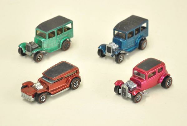 4 Hot Wheel Redline Vehicles: Two classic 31 Ford Woodies, The Demon, Classic 32 Ford Vicky. All are shiny and show light to moderate wear. C6-8
