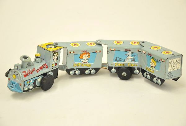 Scarce Marx Jetson Express: Litho tin wig-wag train. Scarce version with Jetsons cartoon character motif. Mechanism is functional. Shows light to moderate playwear. C7