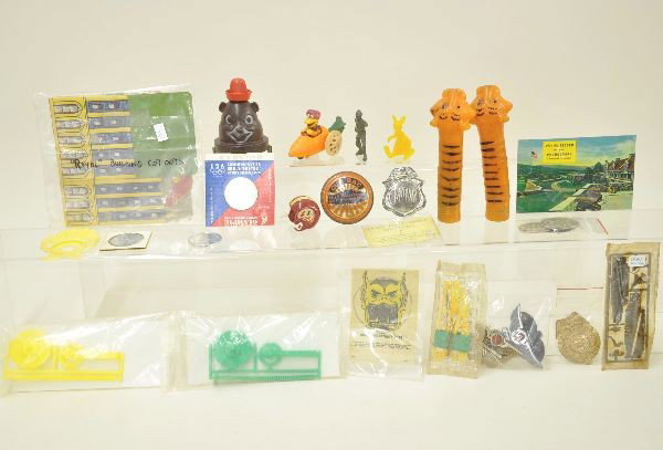 Large Group of Non-Cereal Premiums: Includes Esso tiger bike handles, Borax 20 mule team, Scooby-Doo Mystery Decoder, airline wing pins, G-Men badge, Bosco cup cover, Royal building cut outs and dozens of others.