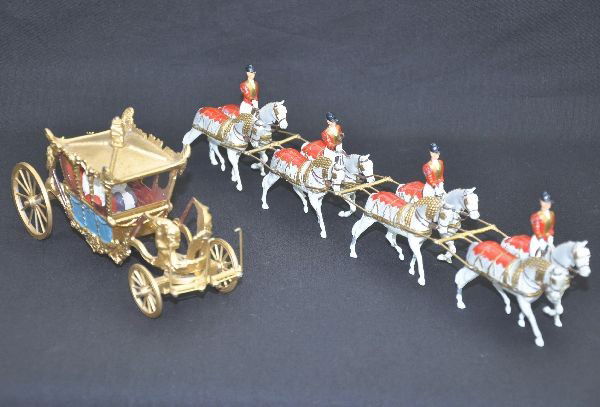 Britains 9401 Coronation Coach: Nice post-war example of this 8 horse coach, paint is bright and shiny, coach is intact, showing only minor wear. C7-8