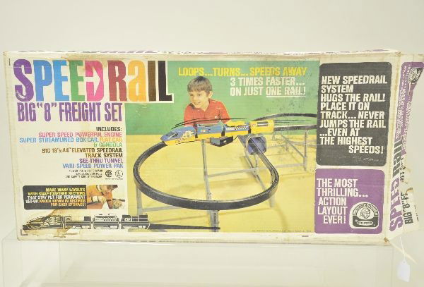 7 Boxed Remco Speed Rail Sets: One of the most fun of all the monorail toys of the 1960's. This lot includes four #7110 Big Eight passenger sets, two #7120 Big Eight freight sets and #7134 Super Freight Set. Six of the sets appear