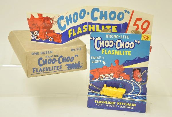 Scarce Micro-Lite Choo Choo Flashlight Store Displ: Complete with all 12 original pieces, cardboard three dimensional display, beautiful, clean and bright, Includes the rare original shelf label and its original box, missing flaps one side. WOW