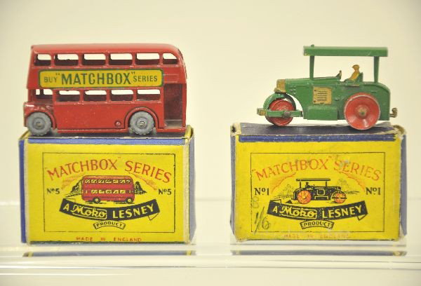 Two Rare First Series Matchboxes: Both have script Moko. #1A1 road roller shows light playwear, C8; #5A1 bus, decals are 95%. Otherwise, like new. Original boxes, road roller box is worn.