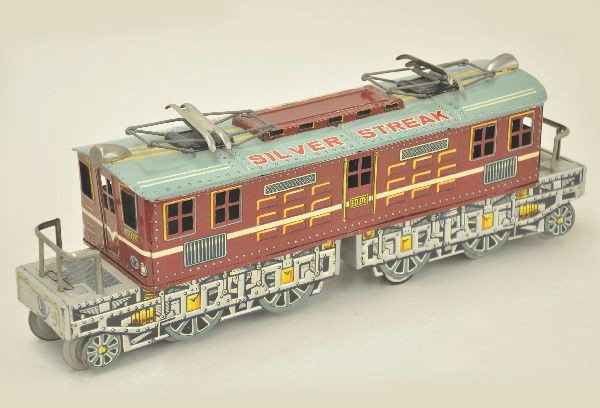 Scarce Modern Toy Silver Streak Electric: These large examples are very difficult to find. This is the largest size of this toy produced, 17 1/2", clean and shiny, shows light playwear. C8