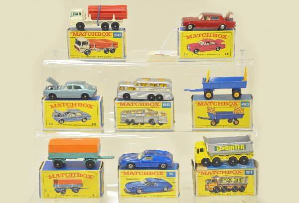 8 Boxed Matchboxes: #24 Rolls Royce, 58 DAF girder truck, 66 Greyhound bus, 53 Ford Zodiac, 2 Mercedes trailer, 5 Lotus, 40 hay trailer, 51 eight wheel tipper, with rough ob. Otherwise, all have nice boxes and are like n