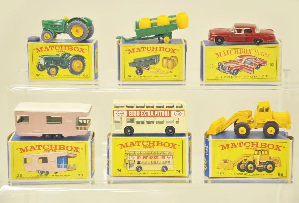 6 Boxed Matchbox Vehicles: 53 Mercedes, 69 Hatra tractor, 74 bus, 50 tractor, gray plastic wheels, 51 trailer, gray plastic wheels, barrels on tree, 23 Caravan. Clean boxes, cars are like new. C9