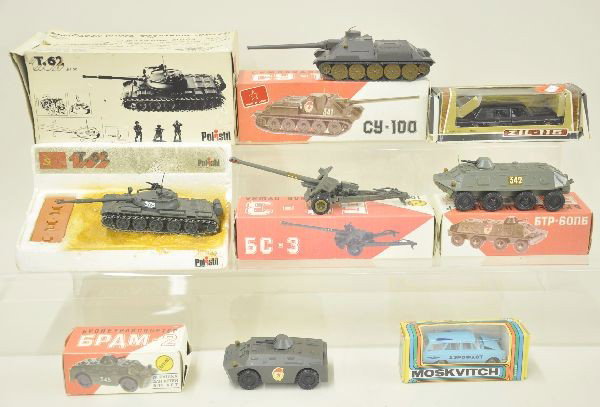 7 Boxed Polistil and Russian Military Vehicles: Polistil T62 Russian tank, worn ob with display insert; Russian 1:43 scale 8 wheeled armor car, 4 wheel scout car, 100mm canon, tank, limousine, Moskvitch wagon. All with original boxes, nice. Vehicle