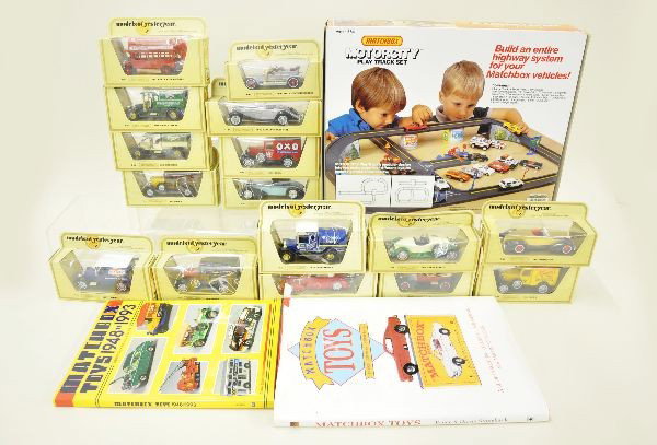 19 pc Matchbox Lot: 1402 Motorcity Play Track Set; two early Matchbox collectors guides; 16 Models of Yesteryear, late 1970's production 17, 19, 25, 14, 23, 10, 3, 22, 21, 18, 22, 2, 13, 20, 21, 5. Cars all have original