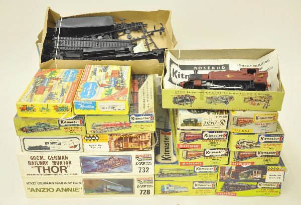 23 Vintage Model Kits: All 1950's and 1960's train related model kits. There are 11 Kitmaster European style kits, two Hawk trolleys, two 1:72 scale Minicraft military trains, and 8 additional miscellaneous kits. All appear