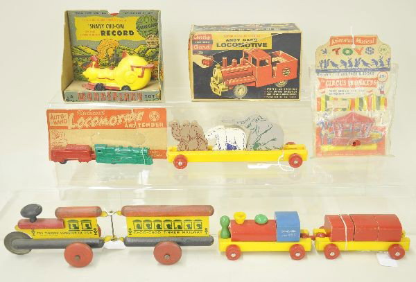 8 Early Train Toys: Pyro Snaily Chu-Chu with original package; Andy Gard battery operated locomotive, appears unused with a clean battery box, clean original box shows wear; Marx auto-wind mechanical locomotive and tende