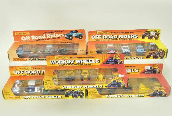 5 Boxed Matchbox Car Assortments: 3 different Off Road Riders sets and two different Workin Wheels sets. Original boxes show minor wear, cars are new. C9