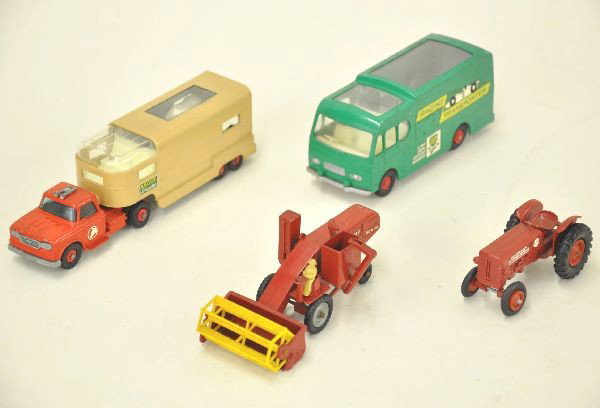4 Matchbox Major Packs Vehicles: MP4 McCormick tractor; M6 racing transporter, minor spotting on decals, but intact; M5 combine, has 1/4" paint chip under scoop; K18 articulated horse van with 4 horses. Otherwise, shows very light pl