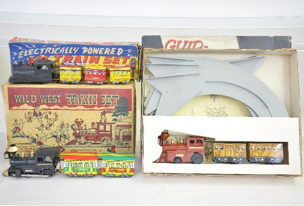 Three Boxed Marx Sets: Electrically powered train set, zig-zag style train with flanged wheels, battery operated untested with track, set box rough, shows light to moderate playwear, C7-8. ;Wild West Train Set, old fashione