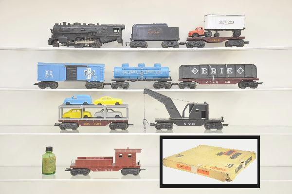 Boxed Marx Allstate Set 9640: 1666 2-4-0 steam loco with smoking cylinders, Allstate tender, Erie flat with NYC tractor and trailer (tractor is C-6) , B&M boxcar, 5545 girder car with hold-down, scarce all black derrick, Allstate