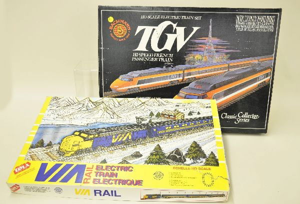 Two Bachmann European Style HO Gauge Train Sets: Set 40-0150 TGV five car streamliner; VIA French streamline, loco and three cars. Both sets appear unused, original boxes, set boxes and inserts. C8-9