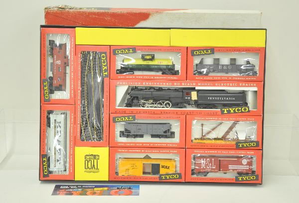 Early Boxed Tyco HO Gauge Set T6127: Mammoth of the Rails, Circa 1960, Mikado steam loco, with 8 freight cars and track, loco box missing cellophane, otherwise appears unrun, original boxes and inserts. Set box top repaired. C8