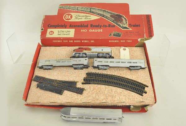 Unusual Boxed OK HO Gauge Train Set Plus: Set No. 101 Commuter-Santa Fe, includes F9 diesel unit, combine and coach, missing 3 plates, track and switches with instructions. Set box worn with display insert. Plus, matching observation. Shows l