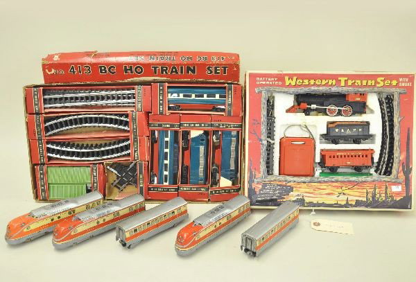 8 pc HO Gauge Lot: TN Japan Western Train Set, loco tender two coaches, battery transformer and track, worn set box; HBW TEE streamliner, 2 diesels, 2 coaches and a trail car with track. All show moderate playwear, C6-7