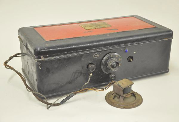 Unusual Atwater Kent Radio: Enamel pressed steel case 21 x 10 1/2 x 7", tube type, 4 dial, blue indicator light. Missing one small knob. Speaker included is damage. Consigner reports it is in working order. Very heavy.
