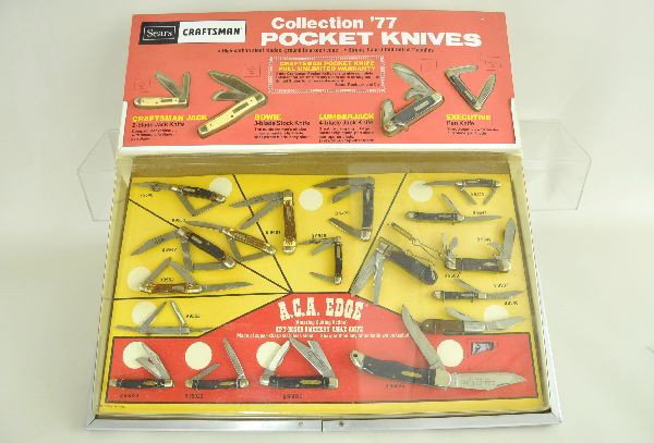 Unusual Sears Craftsman Pocket Knife Store Display: Collection for 1977. Includes 21 knives, still mounted and sealed in their original display. Display shows signs of use, but in wonderful original condition.