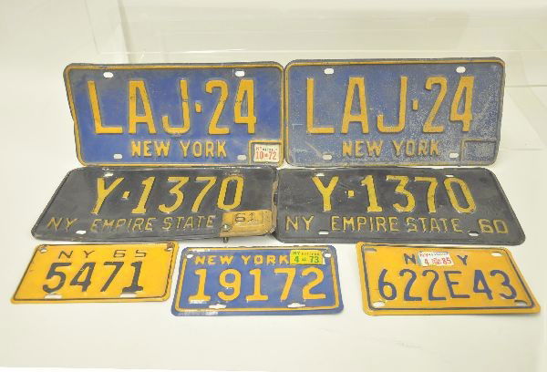 Six Vintage Motorcycle and Automotive License Plat: Motorcycle plates include New York 1965, New York 1970's, New York 1980's, Automotive plates include 1960, 1961 and two 1970's. All show signs of use, but very collectible.