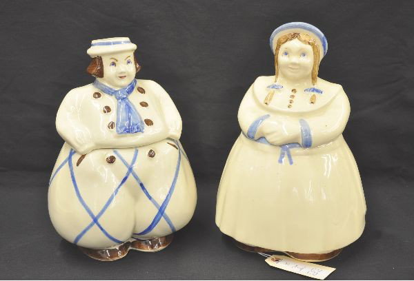 Two Figural Cookie Jars: Tallest is 12", motif is man and women with matching styles. Bases marked USA. No visible damage. Paint is 95%.