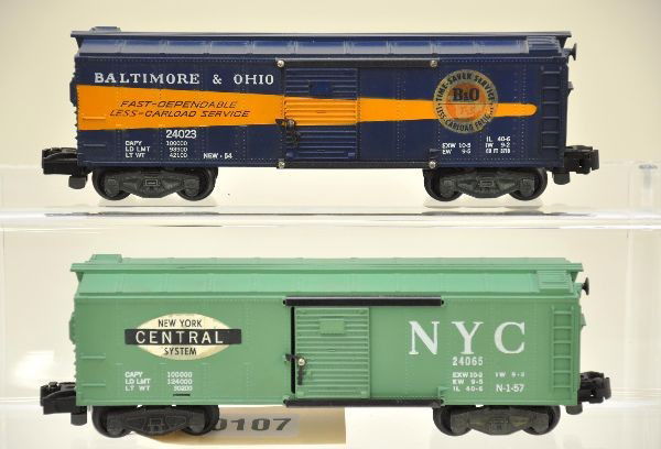 American Flyer S-Gauge 24023 and 24065 Boxcars: 24023 B&O timesaver, decals are dark, one is 100% other is 95%, missing latch nibs; 24065 NYC, stickers are intact but have some light staining, strong lettering. Otherwise, cars show light playwear.