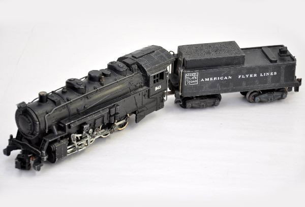 American Flyer S-Gauge 343 NPR Switcher: 0-8-0 steam switcher and tender, cab lettering strong, minor wear to NPR logo one side of tender. Otherwise, shows light to moderate playwear. Should clean to C7