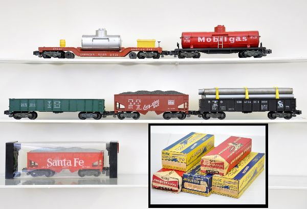 Boxed American Flyer S-Gauge Freight Cars: 24533 track cleaner; 24225 Santa Fe hopper in clear pack; 958 Mobilgas tank car; 921 CB&Q hopper; 911 C&O pipe gondola; 931 T&P gondola. All original boxes, track cleaner is rough. Cars show light to