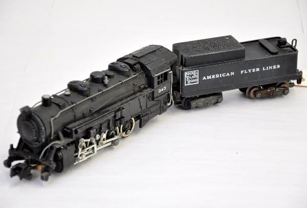 American Flyer 343 Steam Switcher: Nice example of the Nickel Plate Road 0-8-0 steam switcher, strong lettering with intact cab covering, has very small glue spot on one side of tender. Otherwise, shows light to moderate playwear. C7