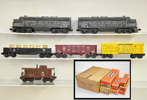Boxed Lionel Train Set 2193W: Circa 1952. 2344 NYC F3 AA diesels, nice graphics with original port hole lens, minor corrosion inside edge of battery box (one side) not visible from outside; 6462 gondola with drum; 6456 hopper; 665