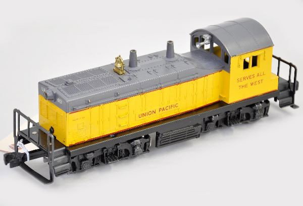Lionel 613 UP NW2 Switcher: Scarce diesel, screw chip repaired. Clean. Otherwise, shows light playwear. C7+