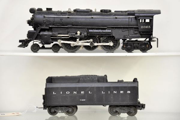 Lionel 2065 Steam Locomotive: Heat stamped lettering, 6026W whistling tender. Shows light to moderate playwear, should easily clean to C7
