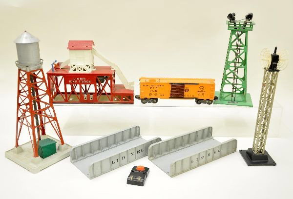 Nice Group of Lionel Accessories: 352 Ice Station with car, minor rust on door guides, with 5 original cubes; 395 flood light tower, missing one wire; 193 industrial water tank; 199 microwave tower, 3 cracks in screens; 2 #314 girder 