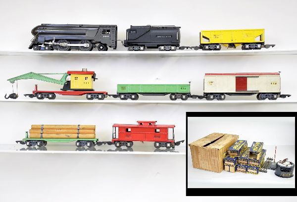 Boxed American Flyer 3/16 O-Gauge Set: 553 torpedo loco in gray; Vanderbilt tender with strong lettering; 481 wrecker, one broken coupler, scarce with red frame; 486 hopper, decals 50%; 476 gondola; 478 boxcar; 482 log car; 484 illuminated