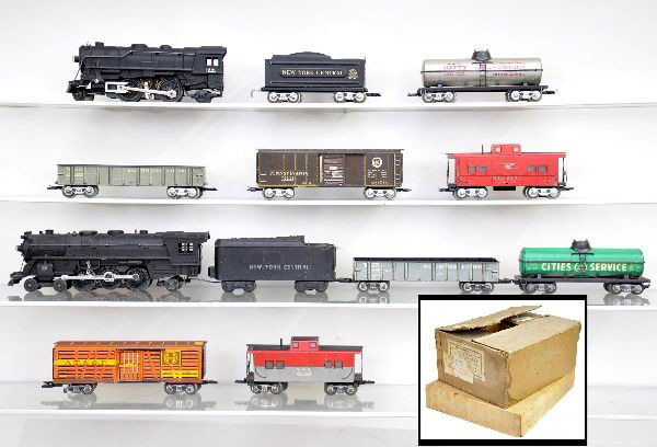 Boxed Marx Sets 25000/12 and 35345: 25000/12 includes cast 999 loco, cab decals 90%, NYC tender, B&O hopper, NIACET tank car, Penn freight car, Reading caboose, track, transformer & original set box with inserts. Montgomery Ward Set 353