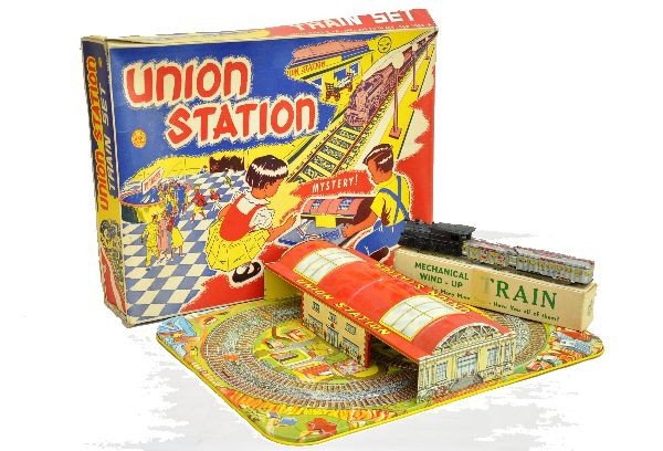 Boxed Marx Mystery Union Station: Very colorful platform toy 19 x 14", train mechanism is functional with original box, has 4 color set box which shows minor wear, toy is like new. C8-9